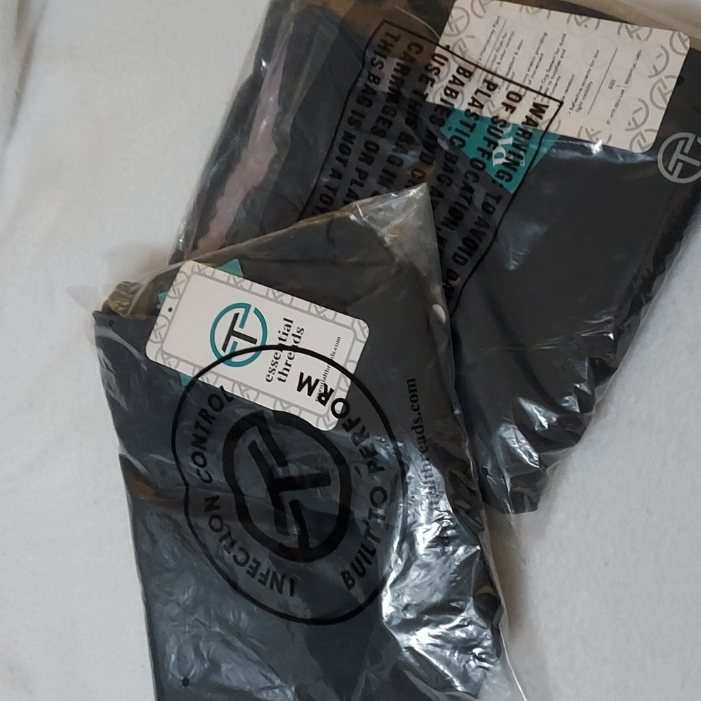 Women's Gray scrub set, essential threads, new with tags in packaging.